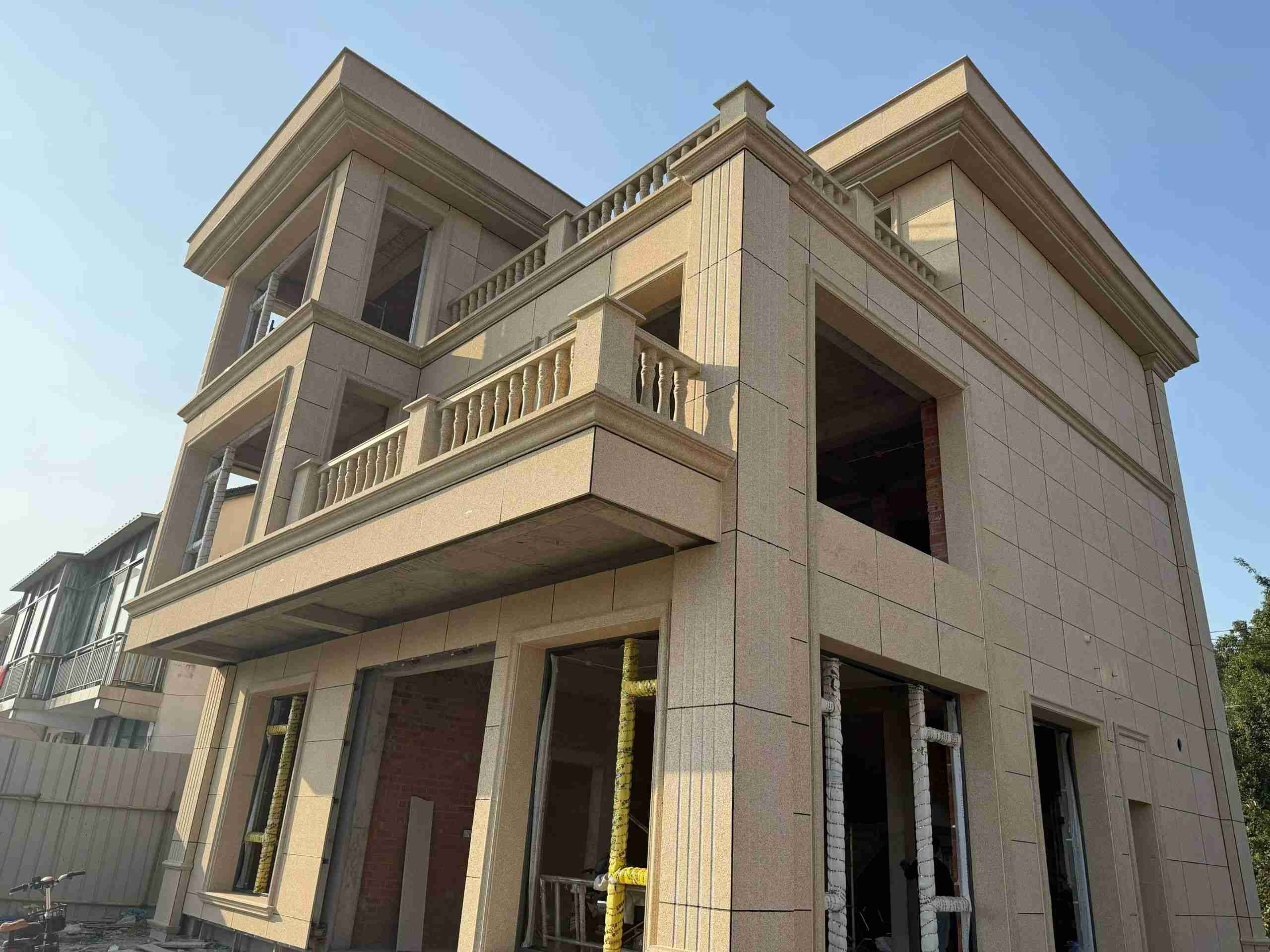 萍乡 黄金麻花岗岩石材荔枝面外墙干挂效果展示